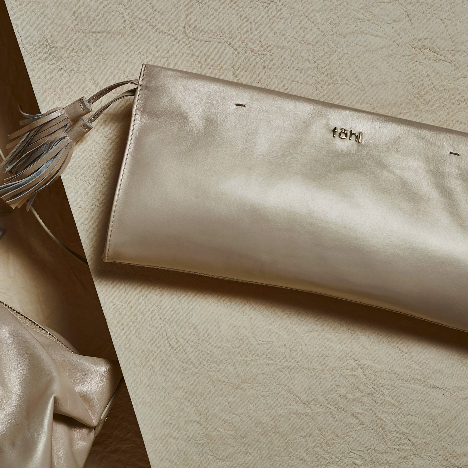 DEMI WOMEN'S CLUTCH - CHAMPAGNE PEARL