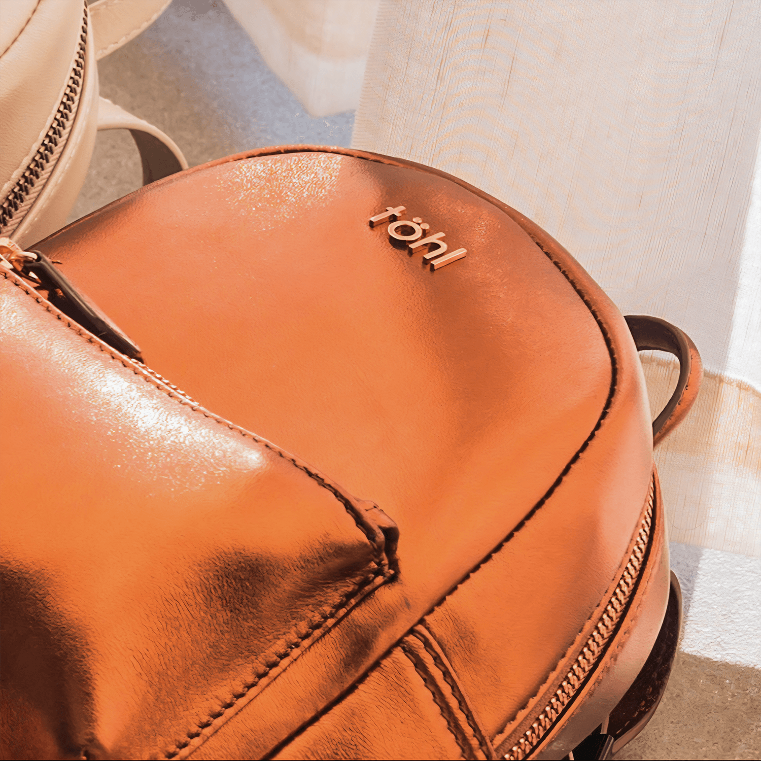 NEVERN WOMEN'S BACKPACK - METALLIC CHOCO